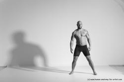 Underwear Gymnastic poses Man Black Muscular Bald Dancing Dynamic poses Academic